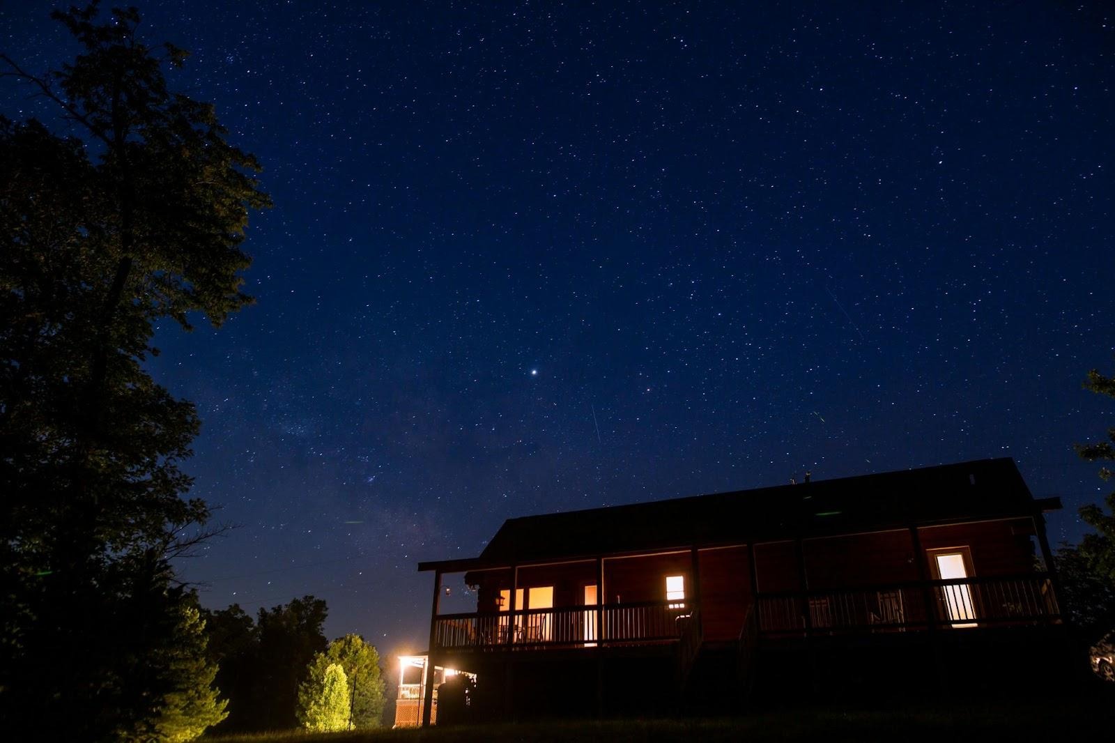 exterior view of a family home shown at night.