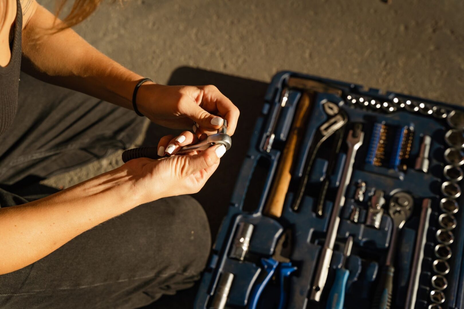 a generator service technician taking tools from a toolbox.