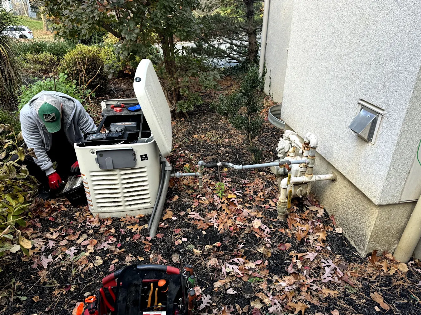 a technician working on a generator.
